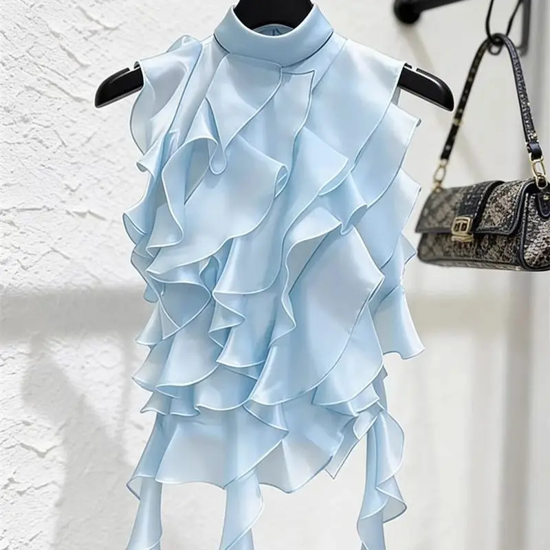 Blue sleeveless top women's 2026 new French petty bourgeoisie beautiful design sense niche super fairy age-reducing shirt summer
Blue sleeveless top women's 2026 new French petty bourgeoisie beautiful design sense niche super fairy age-reducing shirt summer