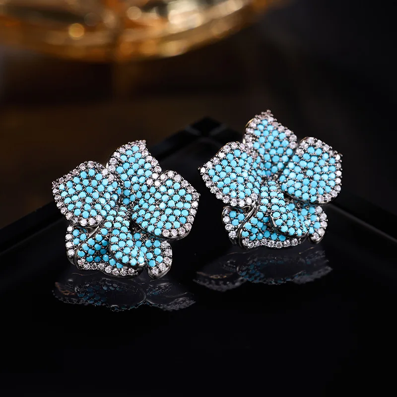 Turquoise Blue Flower Stud Earrings for women Full Paved Cubic Zirconia Statement Jewelry for Banquet Party Gathering
Turquoise Blue Flower Stud Earrings for women Full Paved Cubic Zirconia Statement Jewelry for Banquet Party Gathering