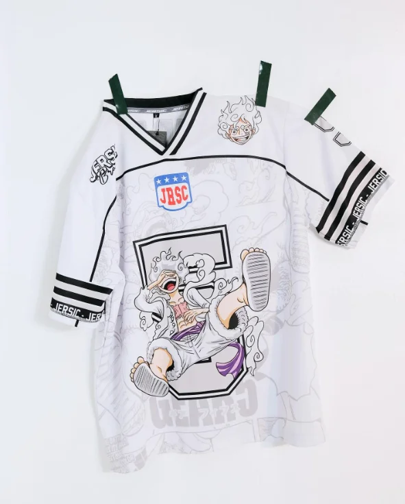 Bandai One Piece Luffy Gear 5 V-neck Jersey White Manga Pattern Anime Shirt 2025 New Japanese Style for Fans
Bandai One Piece Luffy Gear 5 V-neck Jersey White Manga Pattern Anime Shirt 2025 New Japanese Style for Fans