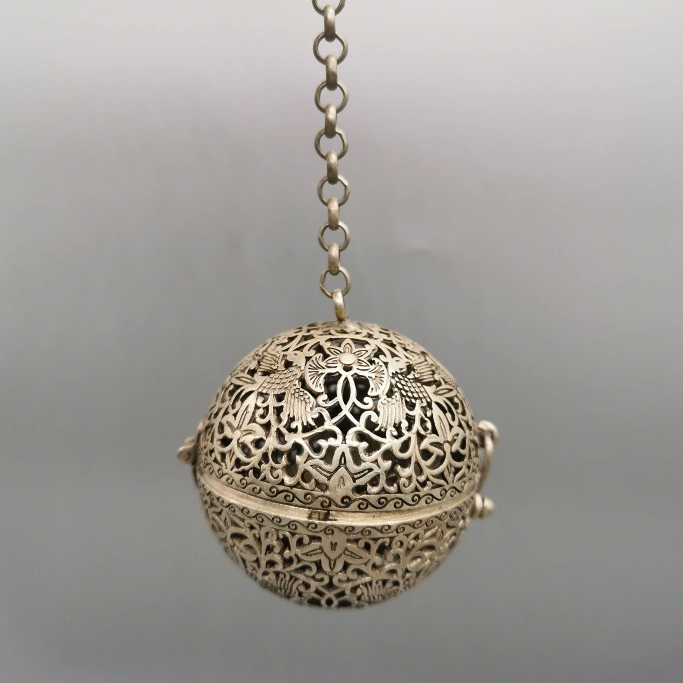 Tibetan Silver Flower and Bird Pattern Incense Ball
Tibetan Silver Flower and Bird Pattern Incense Ball