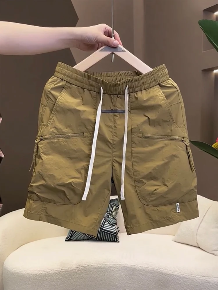 Men's Summer Workwear orts Casual Beach Pants Zipper Multi-ket Qui-Dry Spor Loose Fit Five-Quarter Underwear
Men's Summer Workwear orts Casual Beach Pants Zipper Multi-ket Qui-Dry Spor Loose Fit Five-Quarter Underwear