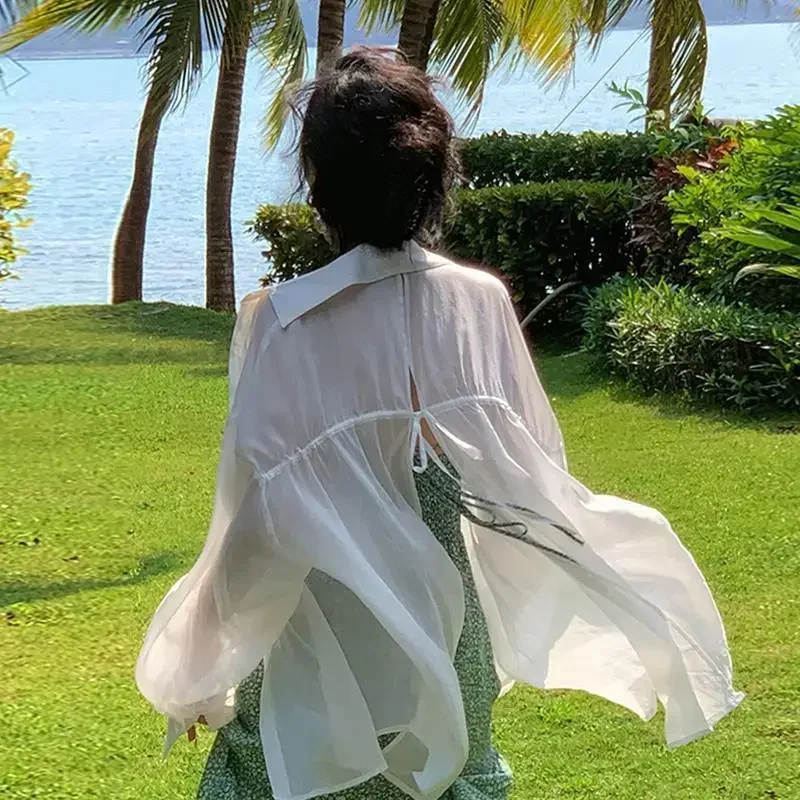 White Sunscreen Shirt Women Sexy Backless Chiffon Sun Protection Cardigan Tops Summer Elegant Solid Loose Casual Blouse
White Sunscreen Shirt Women Sexy Backless Chiffon Sun Protection Cardigan Tops Summer Elegant Solid Loose Casual Blouse