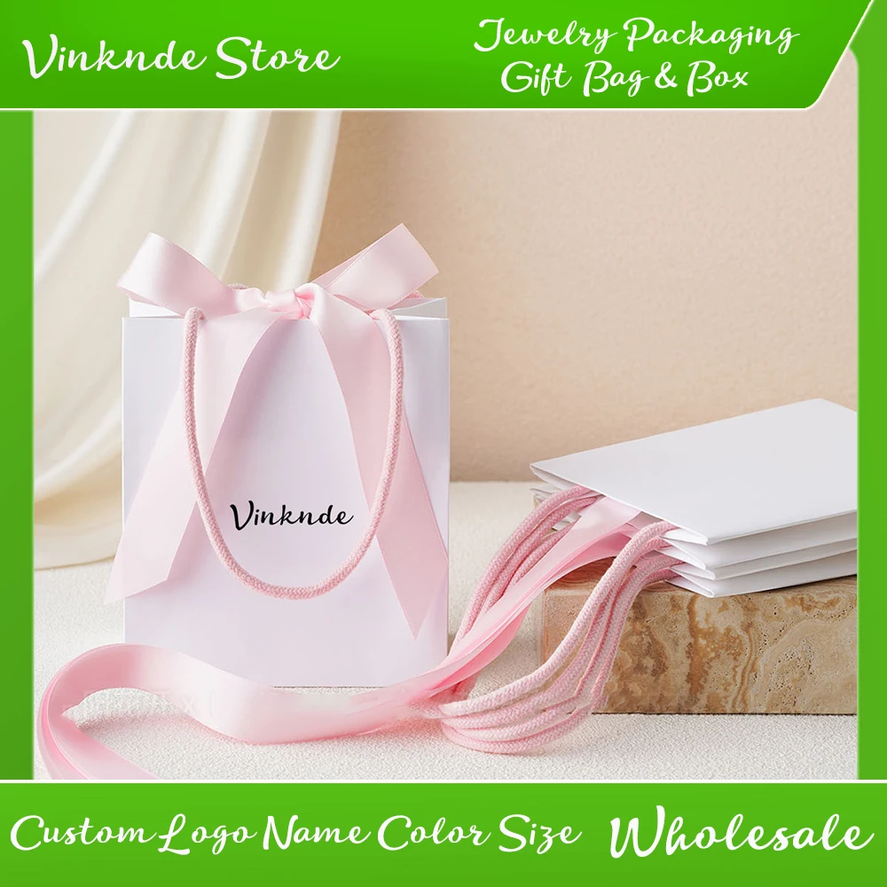 Hot Gift Bags with Bow Ribbon Handles Custom Logo Wrap Bag Fashion Jewelry Cosmetic Travel Packaging Box Wedding Gift Storage
Hot Gift Bags with Bow Ribbon Handles Custom Logo Wrap Bag Fashion Jewelry Cosmetic Travel Packaging Box Wedding Gift Storage