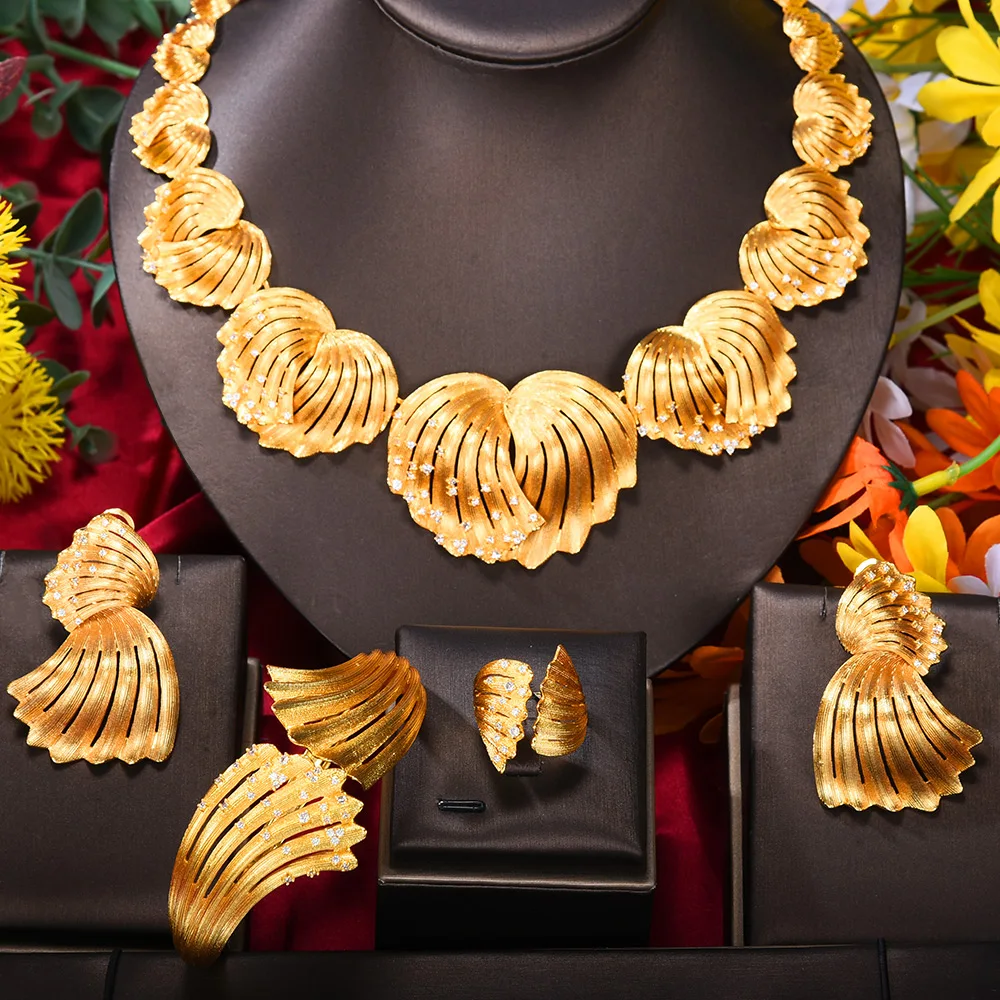 GODKI новый дизайн в виде ракушки Gingo, 4 шт., комплект ювелирных изделий в Дубае для женщин, свадебный кубический циркон, кристалл CZ, индийский африканский свадебный аксессуар
GODKI новый дизайн в виде ракушки Gingo, 4 шт., комплект ювелирных изделий в Дубае для женщин, свадебный кубический циркон, кристалл CZ, индийский африканский свадебный аксессуар