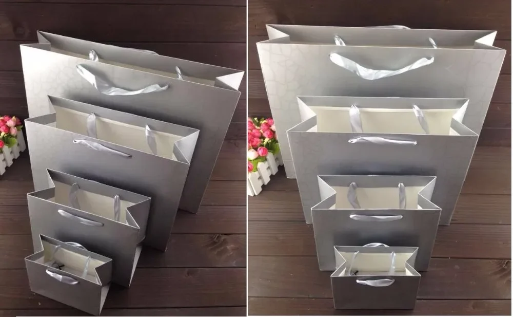 Black/gold Paper bags for gift package,garment packaging bags lot,white paper gift bag with handle
Black/gold Paper bags for gift package,garment packaging bags lot,white paper gift bag with handle