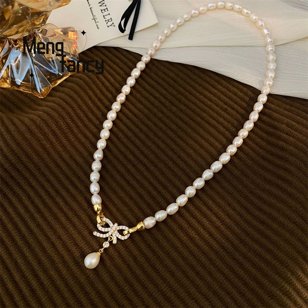 Rice Grain Freshwater Pearl Necklace, Feminine Charm, Bow Pendant, Fashionable And Elegant Sweater Chain, Collarbone Chain
Rice Grain Freshwater Pearl Necklace, Feminine Charm, Bow Pendant, Fashionable And Elegant Sweater Chain, Collarbone Chain