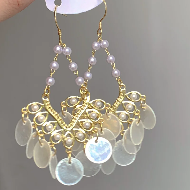 Ethnic style earrings exaggerated round face suitable for earrings earrings summer
Ethnic style earrings exaggerated round face suitable for earrings earrings summer