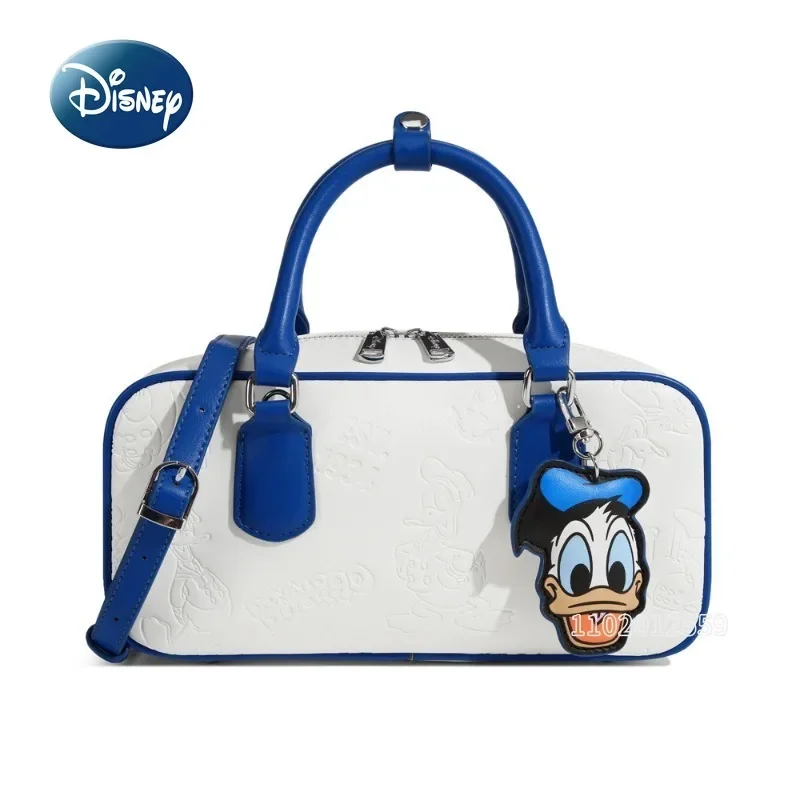 Оригинальная новая женская сумка Disney Donald Duck, роскошная брендовая модная трендовая женская сумка на плечо, милая квадратная женская сумка с героями мультфильмов
Оригинальная новая женская сумка Disney Donald Duck, роскошная брендовая модная трендовая женская сумка на плечо, милая квадратная женская сумка с героями мультфильмов