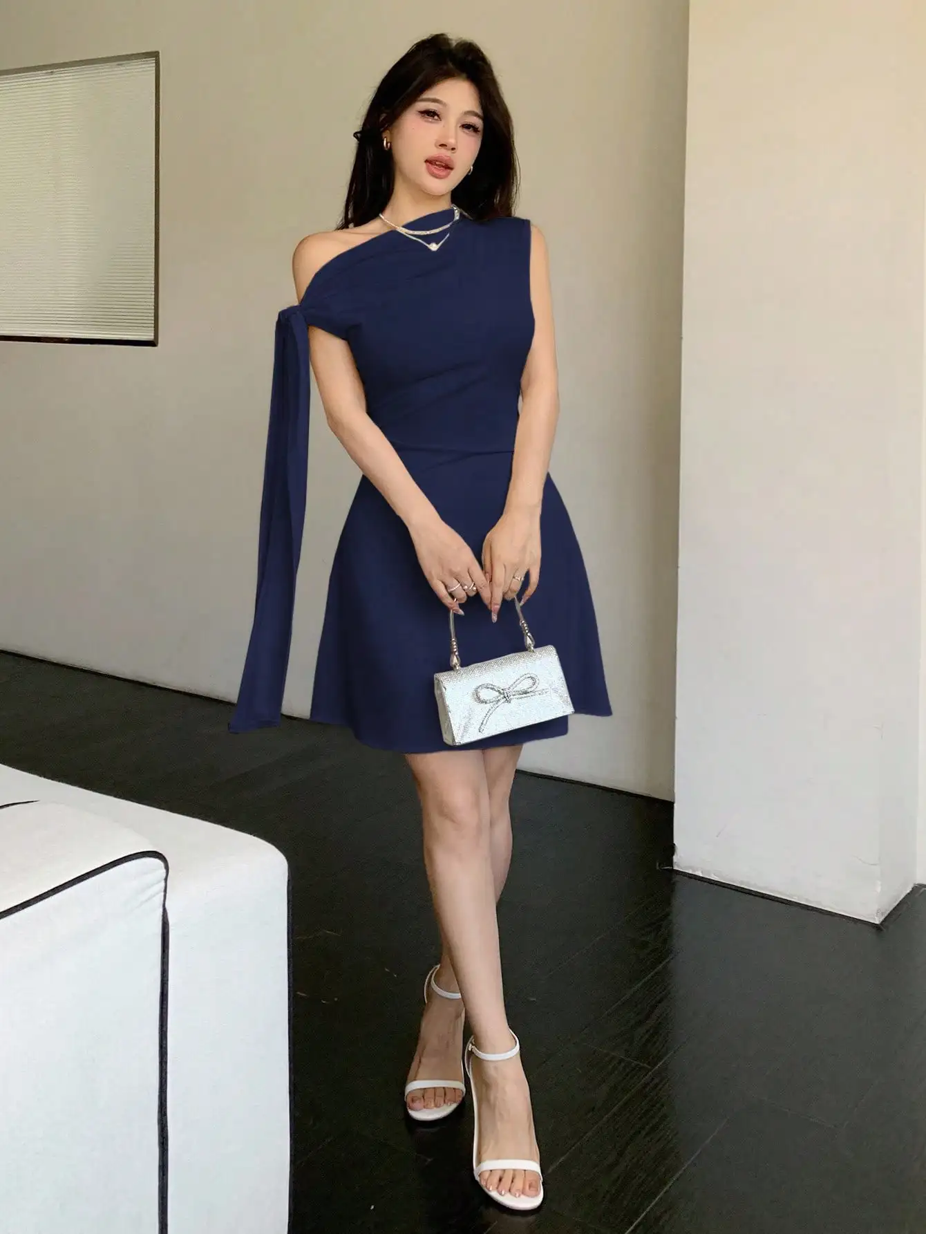 Women Asymmetrical One Shoulder Short Dress With Tie-Up Detail
Women Asymmetrical One Shoulder Short Dress With Tie-Up Detail