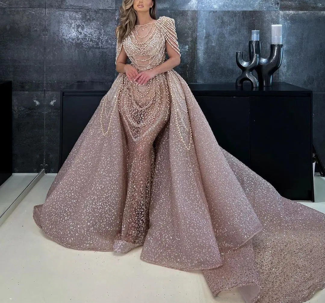 Exquisite Mermaid Evening Dresses Sleeveless V Neck Pearls Sequins Appliques 3D Lace Detachable Train Prom Dresses Custom Made
Exquisite Mermaid Evening Dresses Sleeveless V Neck Pearls Sequins Appliques 3D Lace Detachable Train Prom Dresses Custom Made
