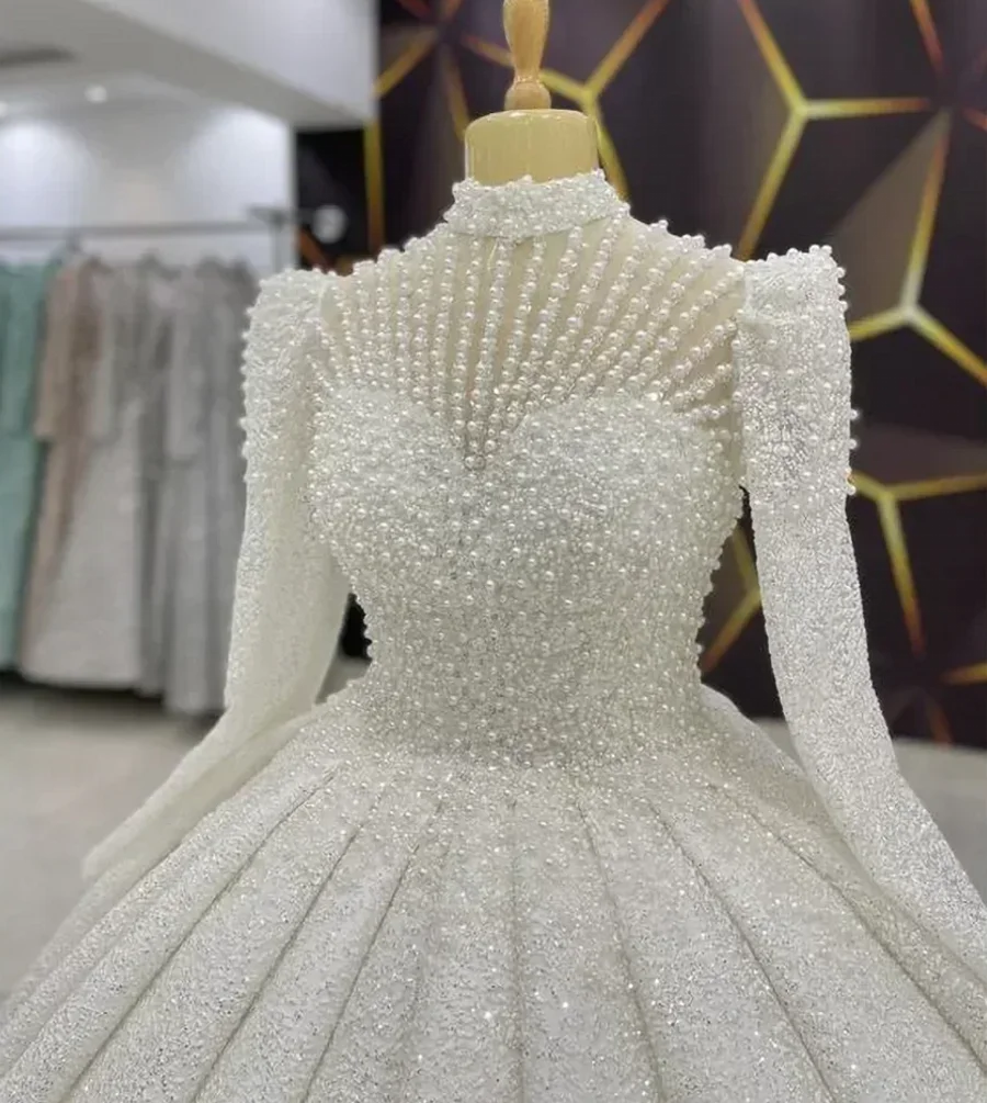 High End Pearls Wedding Dress 2026 High Collar Long Sleeves Ball Gown Beads Sequined Birde Bridal Gowns New Vestido De Novia
High End Pearls Wedding Dress 2026 High Collar Long Sleeves Ball Gown Beads Sequined Birde Bridal Gowns New Vestido De Novia
