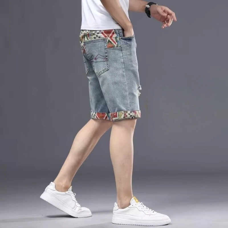 Trendy Summer Collection Embroidered Ripped Denim Shorts for Men Korean Style Mid-Length New Fashion for Casual Everyday Wear
Trendy Summer Collection Embroidered Ripped Denim Shorts for Men Korean Style Mid-Length New Fashion for Casual Everyday Wear