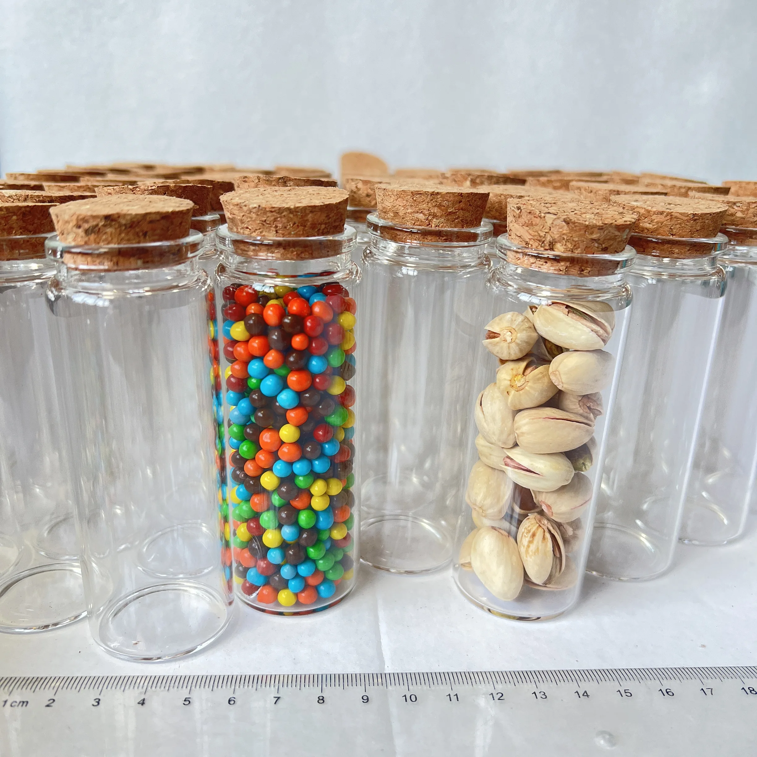 8/18 Pcs 26x37x100mm 80ml Glass Bottles with Cork Candy Spice Jars Crafts Wedding Favors Storage Home Decor Test tube
8/18 Pcs 26x37x100mm 80ml Glass Bottles with Cork Candy Spice Jars Crafts Wedding Favors Storage Home Decor Test tube