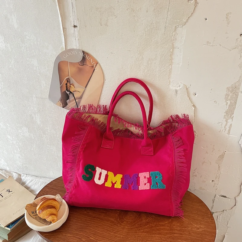 2026 Summer Canvas Tote Bag Women Large Capacity Fringe Handbag Colorful Letter Embroidery Beach Shoulder Bag for Vacation
2026 Summer Canvas Tote Bag Women Large Capacity Fringe Handbag Colorful Letter Embroidery Beach Shoulder Bag for Vacation