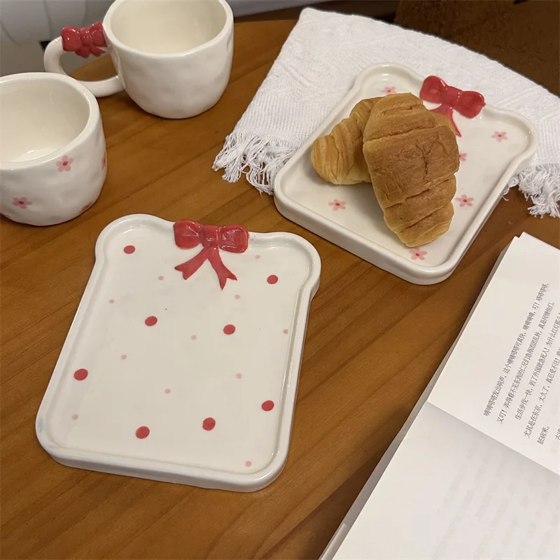 Handmade Relief Bow Bread Ceramic Plate French Retro Lovely Dessert Cake Home Tableware Coffee Breakfast Catering Container
Handmade Relief Bow Bread Ceramic Plate French Retro Lovely Dessert Cake Home Tableware Coffee Breakfast Catering Container
