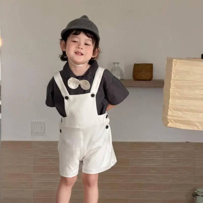 2026 Summer New Children Short Sleeve Shirts + Overalls 2pcs Suit Fashion Boys Solid Casual Strap Shorts Cotton Toddler Outfits
2026 Summer New Children Short Sleeve Shirts + Overalls 2pcs Suit Fashion Boys Solid Casual Strap Shorts Cotton Toddler Outfits