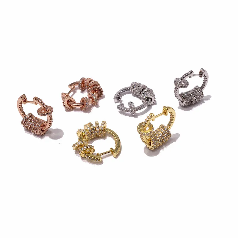 Exaggerated street creative design, metal full diamond dynamic multi ring rotating opening cross earrings
Exaggerated street creative design, metal full diamond dynamic multi ring rotating opening cross earrings