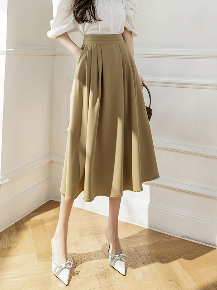 Khaki High Waist A-Line Midi Skirt Women's Spring Autumn 2026 New Style Slimming Elegant Umbrella Skirt Korean Version Folded
Khaki High Waist A-Line Midi Skirt Women's Spring Autumn 2026 New Style Slimming Elegant Umbrella Skirt Korean Version Folded