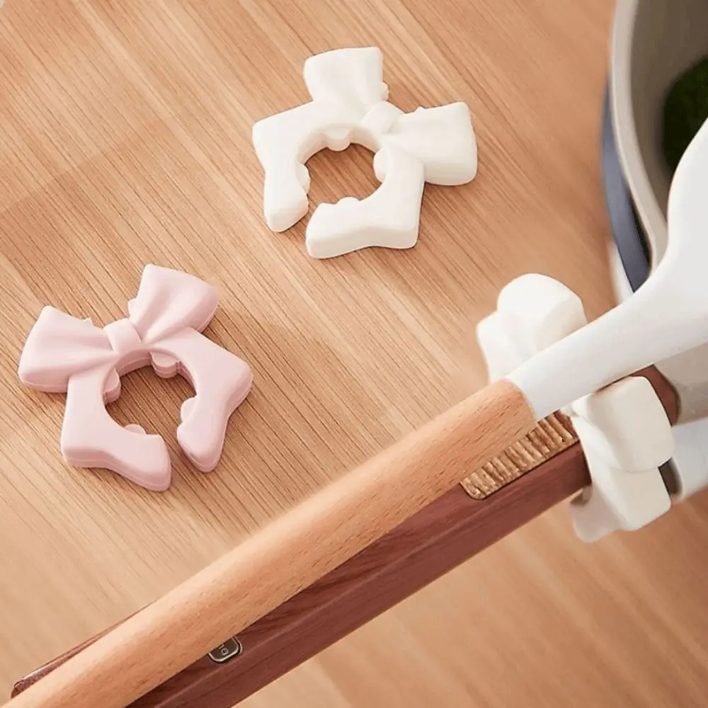 5pcs Anti-Overflow Bow Spatula Holder Non-Slip Base Heat Resistant Spatula Protective Rack Silicone Space Saving
5pcs Anti-Overflow Bow Spatula Holder Non-Slip Base Heat Resistant Spatula Protective Rack Silicone Space Saving