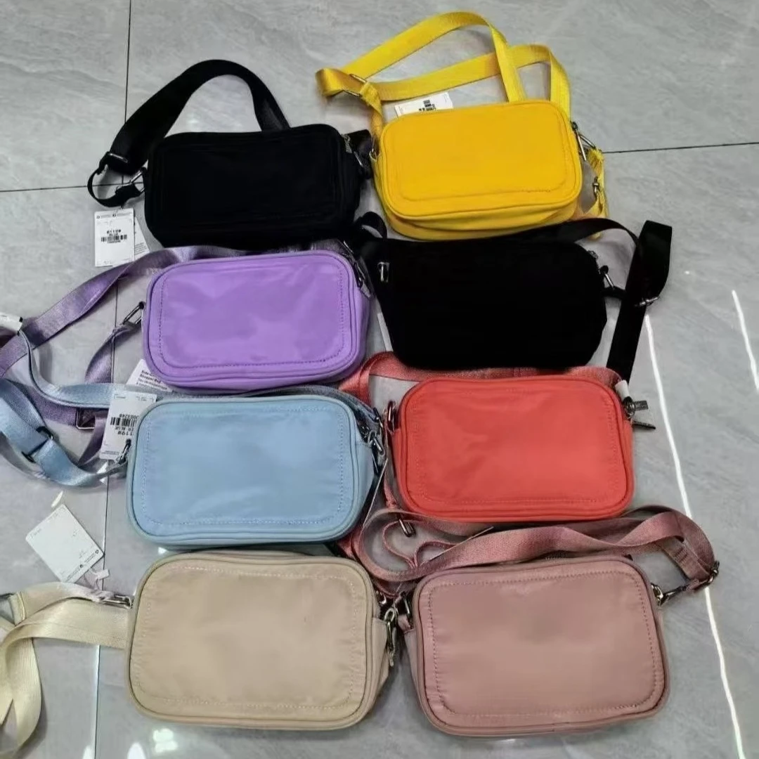 With Metal Logo 2L Belt Bag Fashion Casual Women Diagonal Bags On The Move Travel Crossbody Camera Bag Unisex Outdoor Sport Pack 
With Metal Logo 2L Belt Bag Fashion Casual Women Diagonal Bags On The Move Travel Crossbody Camera Bag Unisex Outdoor Sport Pack