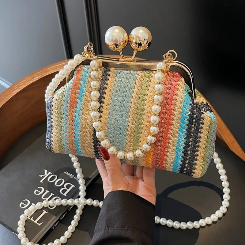 Summer Bohemian Style Colored Striped Straw Woven Bag Fashionable Kiss-Lock Pearl Chain Crossbody Bag Evening Purse for Women
Summer Bohemian Style Colored Striped Straw Woven Bag Fashionable Kiss-Lock Pearl Chain Crossbody Bag Evening Purse for Women