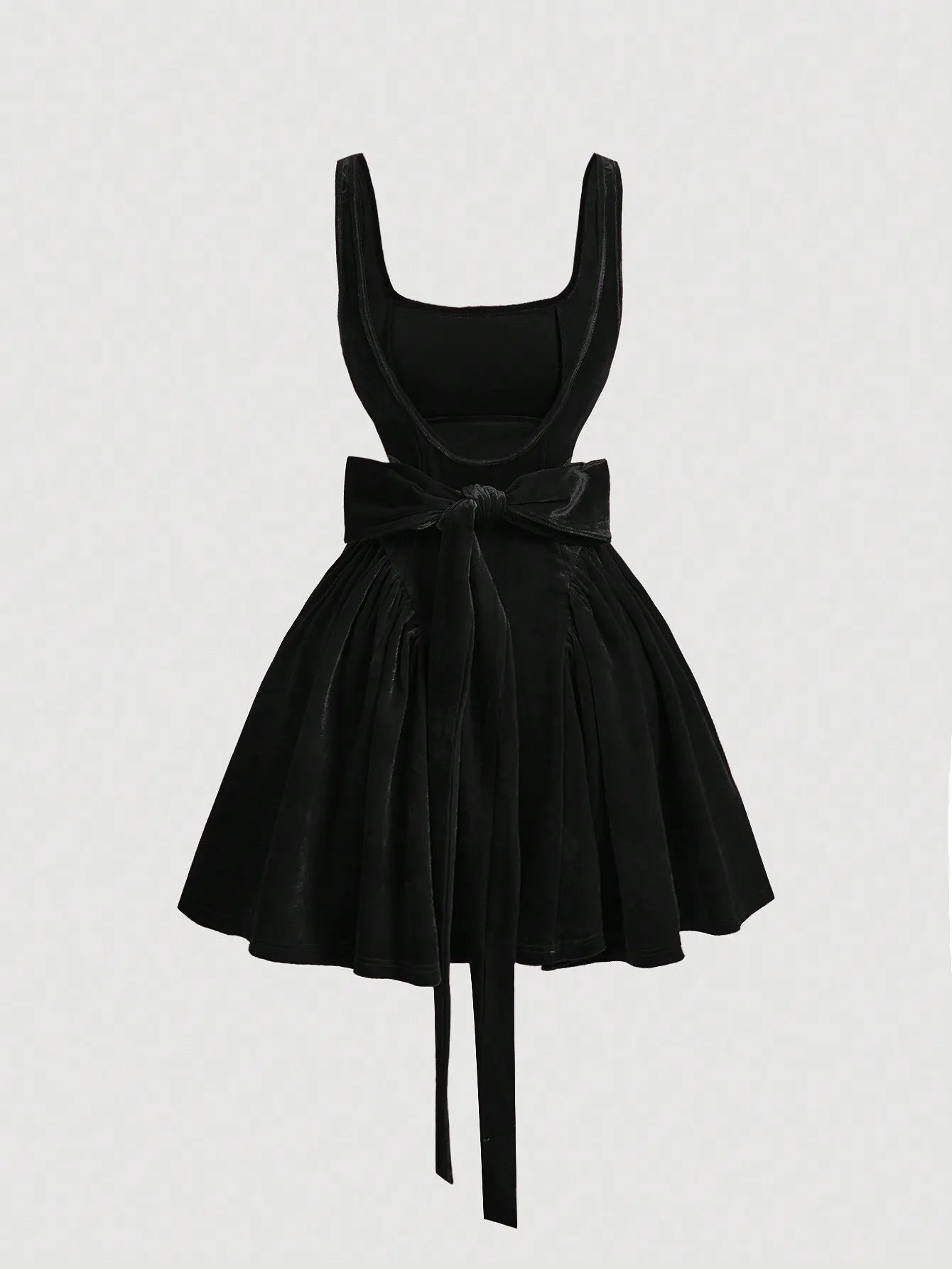 Черное бархатное мини-платье с квадратным вырезом, бантом на талии и расклешенной юбкой
Черное бархатное мини-платье с квадратным вырезом, бантом на талии и расклешенной юбкой
