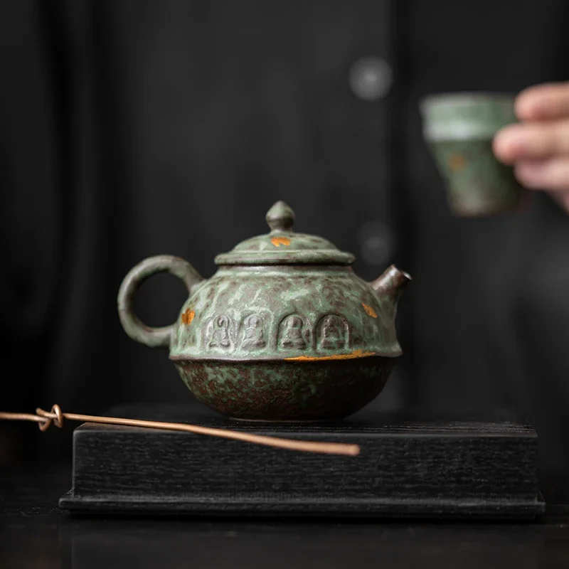 150ML Dunhuang Cultural And Creative Coarse Pottery Teapot Old Rock Mud Teapot Ball Hole Filter Tea Maker Ceramic Kungfu Tea Set
150ML Dunhuang Cultural And Creative Coarse Pottery Teapot Old Rock Mud Teapot Ball Hole Filter Tea Maker Ceramic Kungfu Tea Set