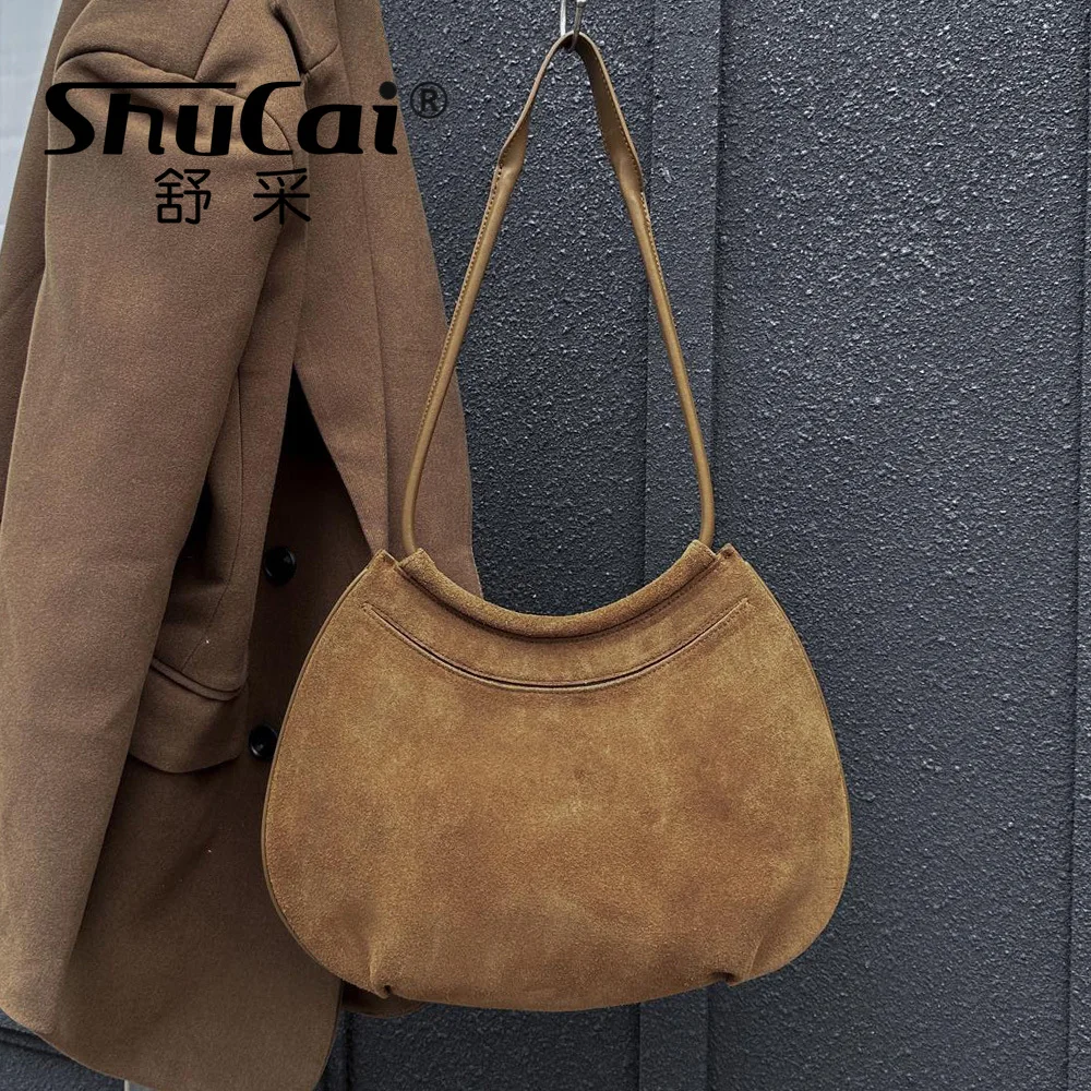 Женская модная сумка на плечо из натуральной матовой замши, роскошная дизайнерская брендовая сумка в форме полумесяца под мышками, высокое качество из воловьей кожи
Женская модная сумка на плечо из натуральной матовой замши, роскошная дизайнерская брендовая сумка в форме полумесяца под мышками, высокое качество из воловьей кожи