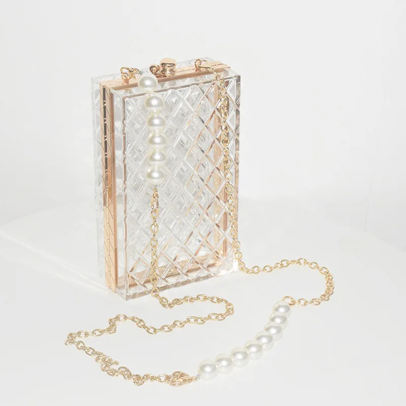 Уникальная Универсальная женская сумка, новинка 2024, летние прозрачные акриловые ручные клатчи, сумка для телефона через плечо с жемчужной цепочкой
Уникальная Универсальная женская сумка, новинка 2024, летние прозрачные акриловые ручные клатчи, сумка для телефона через плечо с жемчужной цепочкой