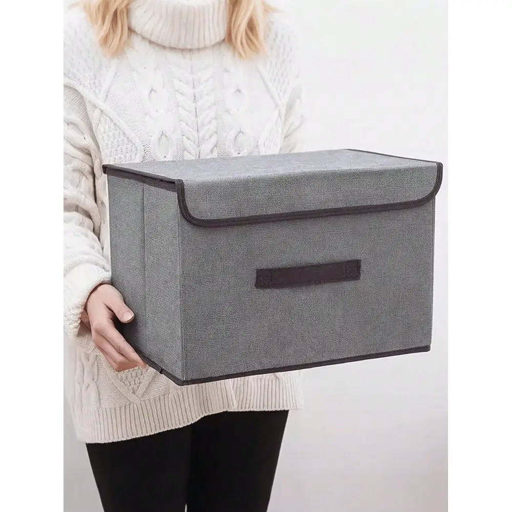 Grey Fabric Foldable Storage Box, Made Of Simple Solid Color Fabric With Lid And Rigid Design, Equipped With Convenient Side Ha
Grey Fabric Foldable Storage Box, Made Of Simple Solid Color Fabric With Lid And Rigid Design, Equipped With Convenient Side Ha
