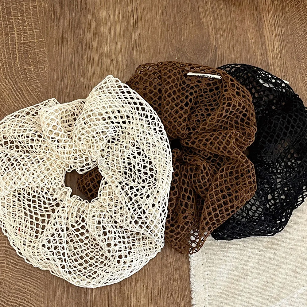 Summer beach minimalist style retro hollow knitted fishing net large intestine hair loop Korean lazy vacation hair rope
Summer beach minimalist style retro hollow knitted fishing net large intestine hair loop Korean lazy vacation hair rope