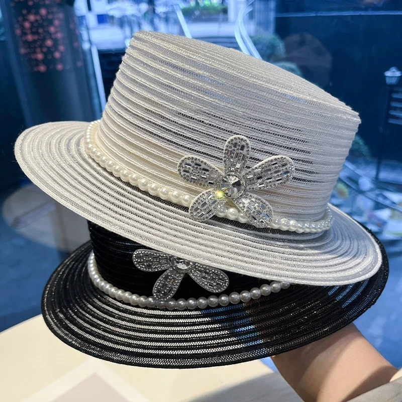 Ladies' Simple Flat-top White Top Hat, Elegant and Fashionable Pearl Net Gauze Hat, Vacation Sun Protection and Shading Hat
Ladies' Simple Flat-top White Top Hat, Elegant and Fashionable Pearl Net Gauze Hat, Vacation Sun Protection and Shading Hat