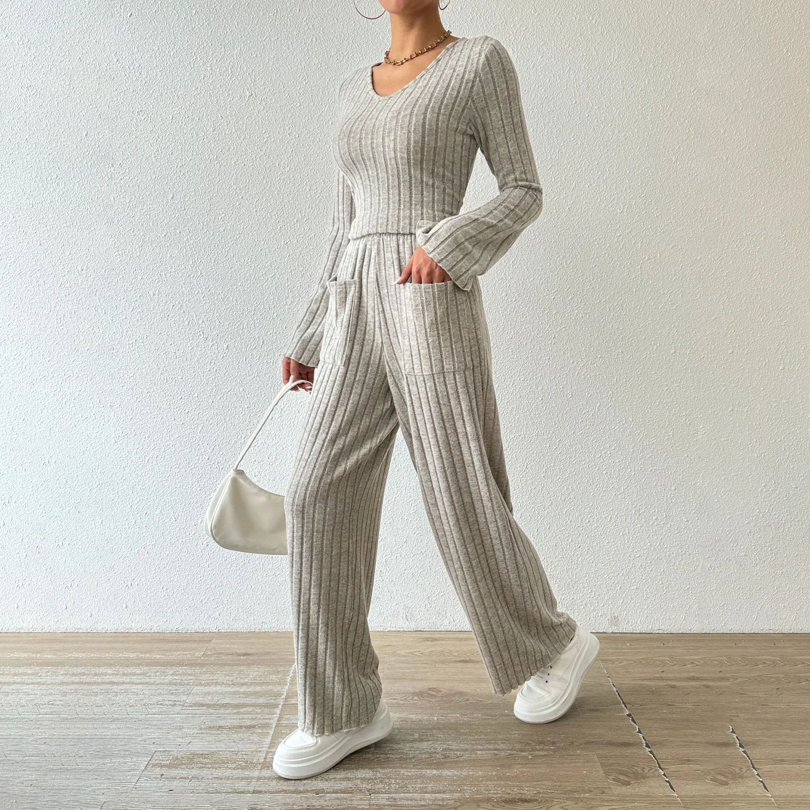 2 Piece Women's Loose Knitted Outfits Solid Color Ribbed V-Neck Long Sleeve Tops and Elastic Waist Casual Wide Leg Pants Set
2 Piece Women's Loose Knitted Outfits Solid Color Ribbed V-Neck Long Sleeve Tops and Elastic Waist Casual Wide Leg Pants Set