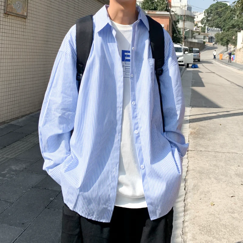 Men's Blue Vertical Striped Long-Sleeved Shirt Button-Up Shirts Korean Style Fashion Loose Blouse Vacation Resort Wear
Men's Blue Vertical Striped Long-Sleeved Shirt Button-Up Shirts Korean Style Fashion Loose Blouse Vacation Resort Wear