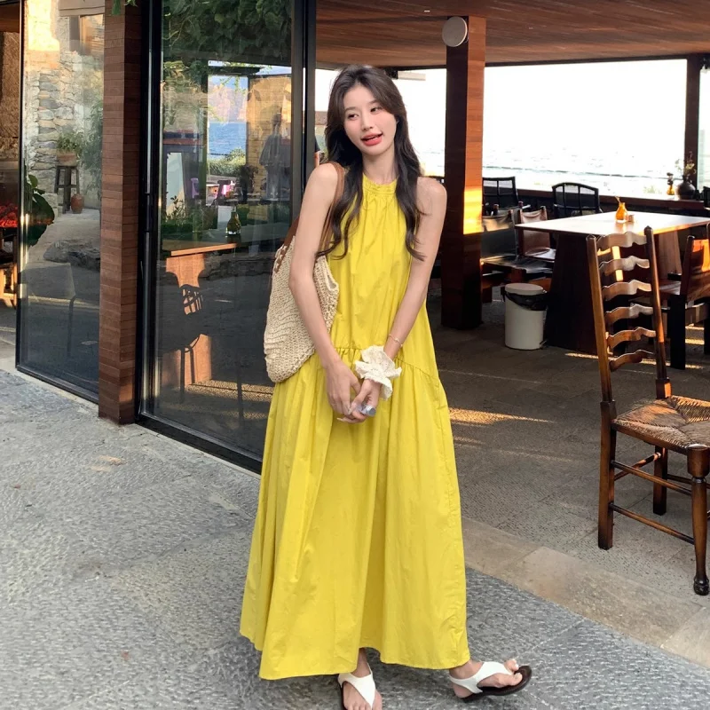 French-style yellow halter neck off-shoulder dress for women in summer2026New stylish loose-fitting long dress with pockets in a
French-style yellow halter neck off-shoulder dress for women in summer2026New stylish loose-fitting long dress with pockets in a
