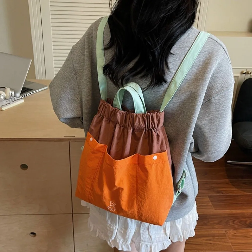 Нейлоновый рюкзак с несколькими карманами, контрастная холщовая сумка через плечо в корейском стиле, большая вместительная сумка через плечо, женская сумка для улицы
Нейлоновый рюкзак с несколькими карманами, контрастная холщовая сумка через плечо в корейском стиле, большая вместительная сумка через плечо, женская сумка для улицы