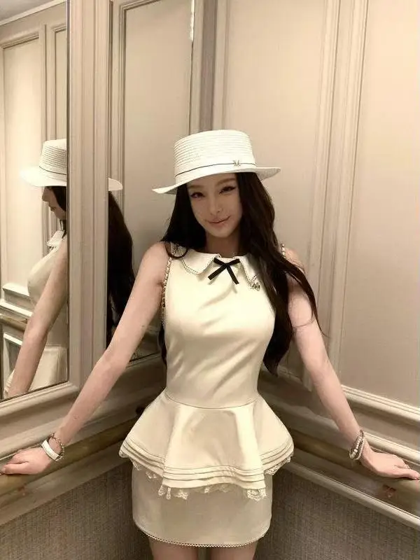 Elegant White Ruffle Sleeveless Doll Collar High Waist Half Skirt Two Piece Set for Women Fashionable French Style Summer Outfit
Elegant White Ruffle Sleeveless Doll Collar High Waist Half Skirt Two Piece Set for Women Fashionable French Style Summer Outfit