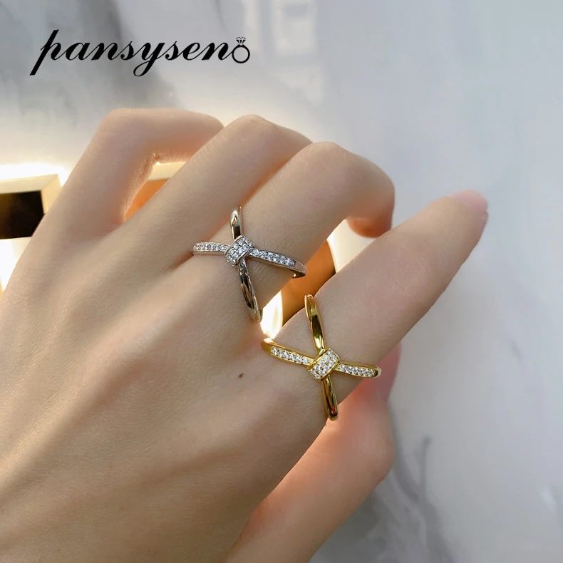 PANSYSEN 925 Sterling Silver Simple High Carbon Diamond Cross Ring Female 18K White Gold Plated Wedding Party Fine Jewelry Gifts
PANSYSEN 925 Sterling Silver Simple High Carbon Diamond Cross Ring Female 18K White Gold Plated Wedding Party Fine Jewelry Gifts