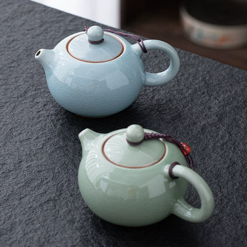 Ceramic Teapot teacup manual Chinese ice crack split teapot can raise Xishi tea pots household Kung Fu tea pot
Ceramic Teapot teacup manual Chinese ice crack split teapot can raise Xishi tea pots household Kung Fu tea pot