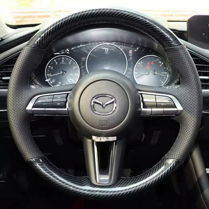 Оригинальная Кожаная оболочка рулевого колеса из углеродного волокна для Mazda чехол рулевого колеса автомобиля CX30 Mazda 3 Axela 2019-2020
Оригинальная Кожаная оболочка рулевого колеса из углеродного волокна для Mazda чехол рулевого колеса автомобиля CX30 Mazda 3 Axela 2019-2020