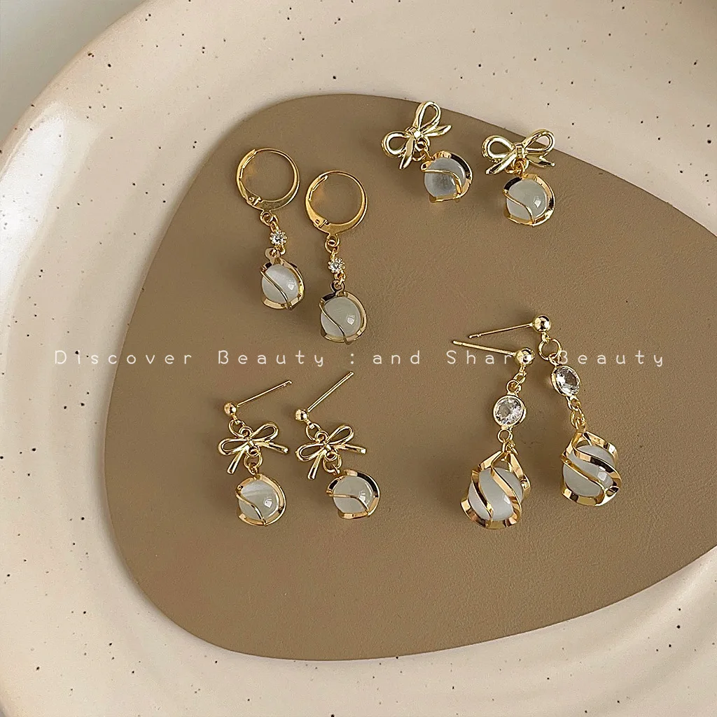 DIY accessories French simple opal pendant earrings women's niche design sweet bow stud earrings light luxury high-end earrings
DIY accessories French simple opal pendant earrings women's niche design sweet bow stud earrings light luxury high-end earrings