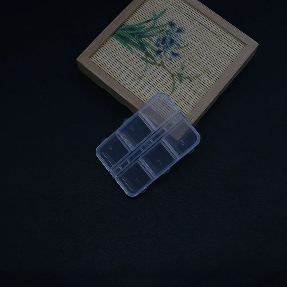 New Small Subpackage Box for Storing Nail Art Diamonds Sequins Jewelry Medicine Samples with A Lid A Portable 6-grid Jewelry Box
New Small Subpackage Box for Storing Nail Art Diamonds Sequins Jewelry Medicine Samples with A Lid A Portable 6-grid Jewelry Box