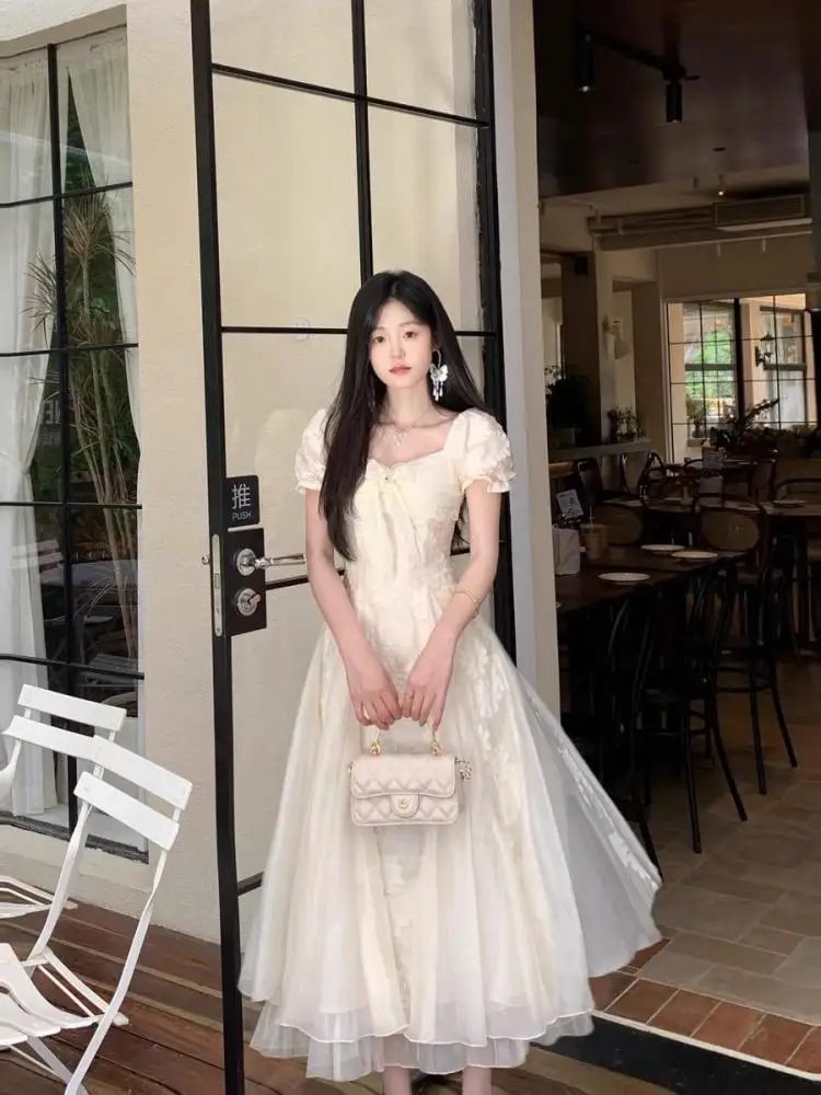 Women Summer Beige Square Neck Short Sleeve Backless Evening Party Dresses French Retro Elegant Slim Vacation Pleated Long Dress
Women Summer Beige Square Neck Short Sleeve Backless Evening Party Dresses French Retro Elegant Slim Vacation Pleated Long Dress