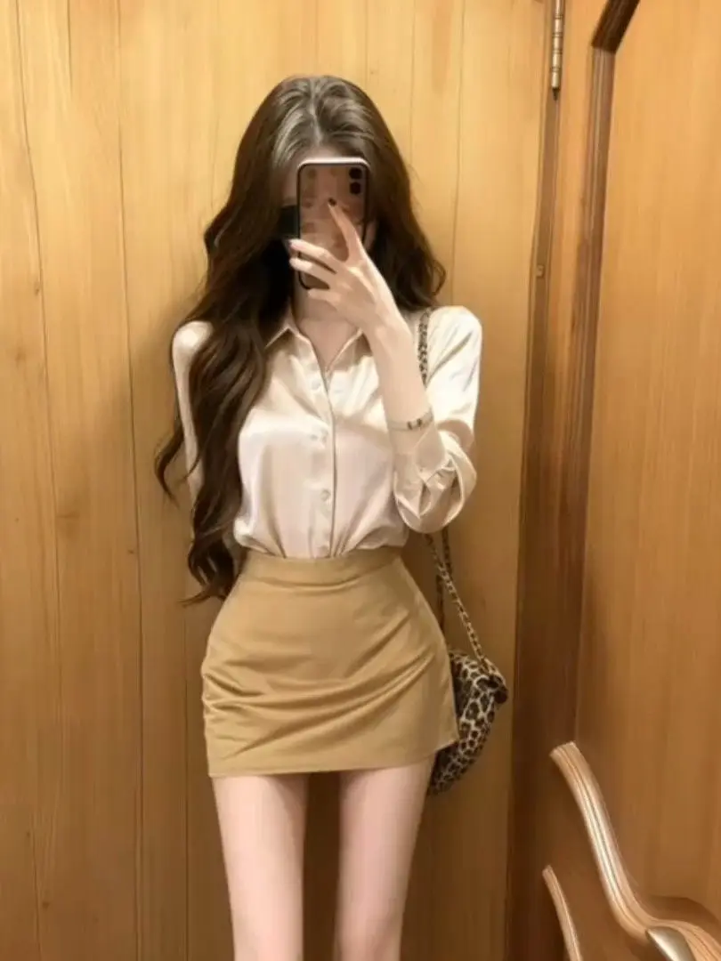 Elegant Slim Fit Shirt And Short Skirt Set Women's Summer Fashion Seven Sleeve Length Shirt High Waist Skirt Ensemble
Elegant Slim Fit Shirt And Short Skirt Set Women's Summer Fashion Seven Sleeve Length Shirt High Waist Skirt Ensemble