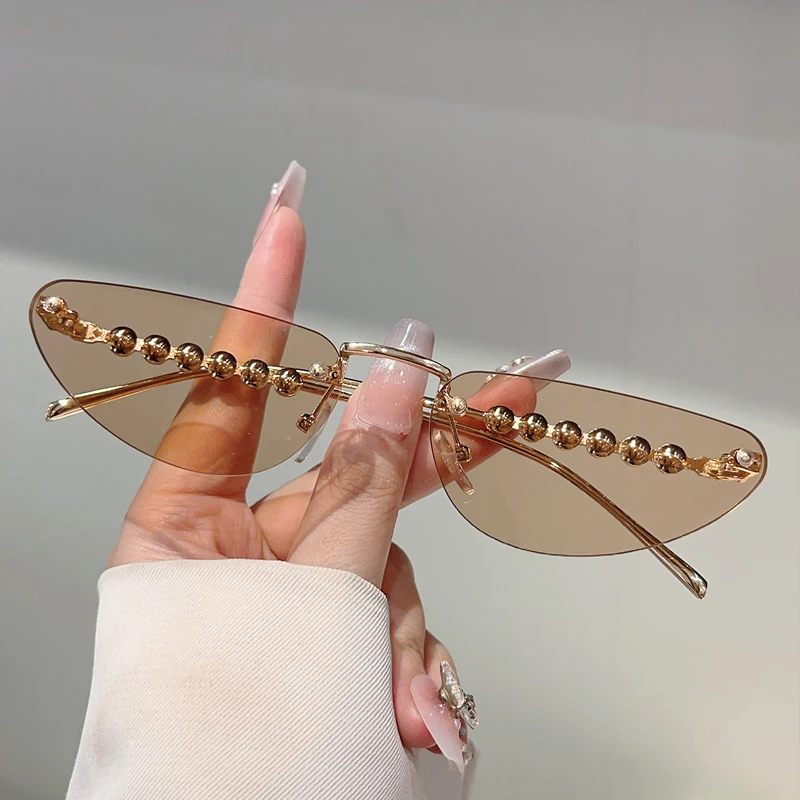 GM LUMIAS Rimless Triangle Sunglasses with Pearls Women New Fashion Vintage Casual Sun Glasses Trendy Brand Design Decor Shades
GM LUMIAS Rimless Triangle Sunglasses with Pearls Women New Fashion Vintage Casual Sun Glasses Trendy Brand Design Decor Shades