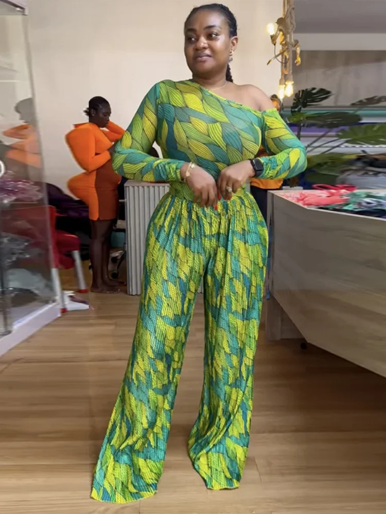 Three Sisters Women's 2025 Spring New Pattern Print Diagonal Neck Long Sleeve Top Wide Leg Pants Pleat Casual Two Piece Set
Three Sisters Women's 2025 Spring New Pattern Print Diagonal Neck Long Sleeve Top Wide Leg Pants Pleat Casual Two Piece Set