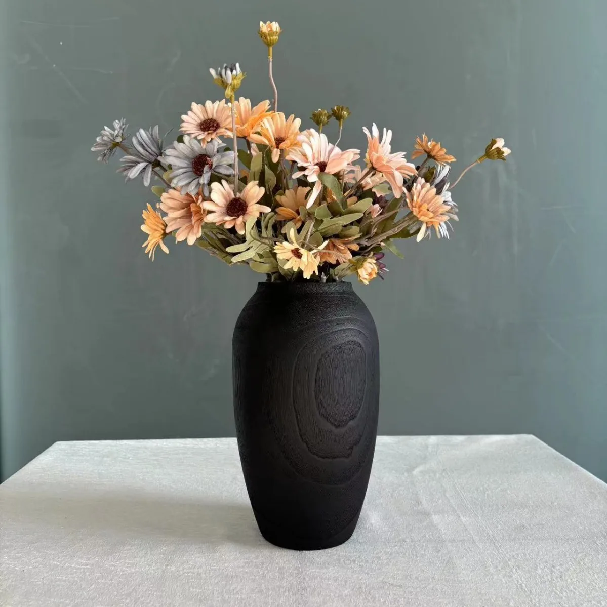 Carbonized paulownia vases. High-grade solid paulownia oval vases flower decoration, living room decoration
Carbonized paulownia vases. High-grade solid paulownia oval vases flower decoration, living room decoration
