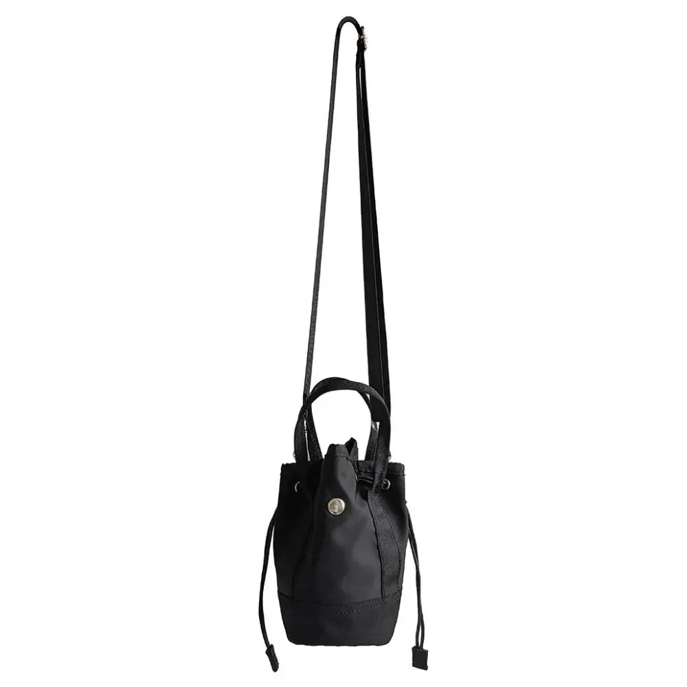 Korean Style Drawstring Bucket Bag Handbag Purse Folded Nylon Shoulder Bag Solid Color Mobile Phone Bag Small Crossbody Bag
Korean Style Drawstring Bucket Bag Handbag Purse Folded Nylon Shoulder Bag Solid Color Mobile Phone Bag Small Crossbody Bag