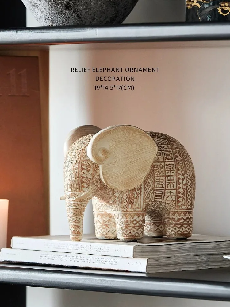 Retro relief elephant auspicious ornament handicraft, new Chinese style living room entrance office decoration
Retro relief elephant auspicious ornament handicraft, new Chinese style living room entrance office decoration