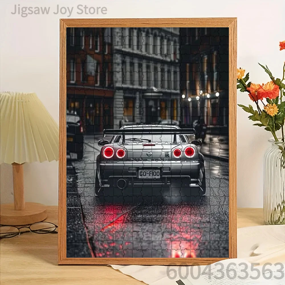 Paper Jigsaw Puzzle Silver Nissan Skyline GT-R R34 Rear View on Wet Urban Street with Red Tail Lights Artwork Brain Teaser
Paper Jigsaw Puzzle Silver Nissan Skyline GT-R R34 Rear View on Wet Urban Street with Red Tail Lights Artwork Brain Teaser